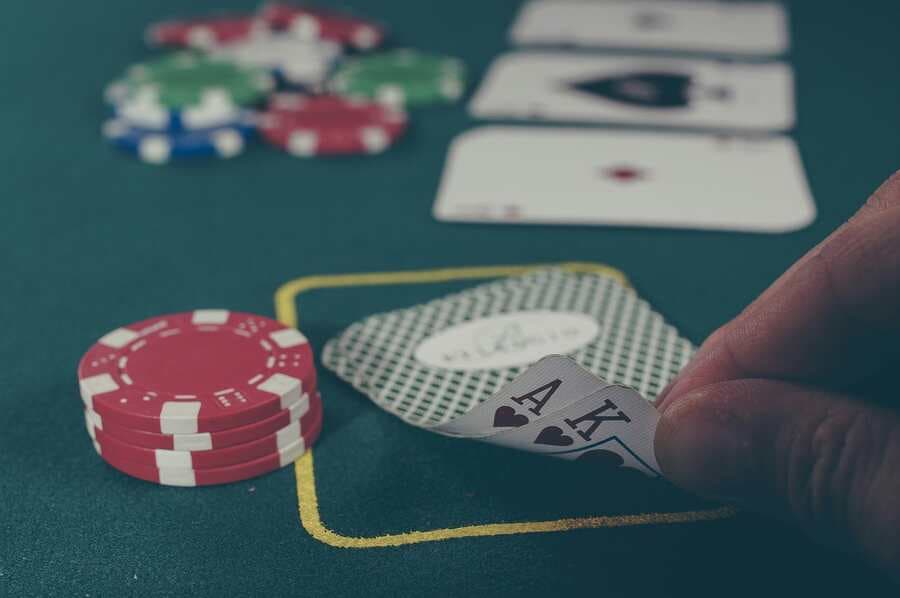 Poker chips and playing cards on a table